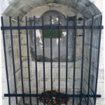 Restored Forsyth Monument with protective fence