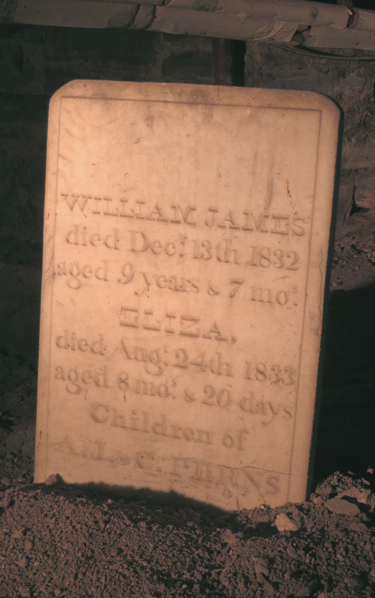 Marker for William James and Eliza Ferns, under the church hall (Credit Mary Davis Little)